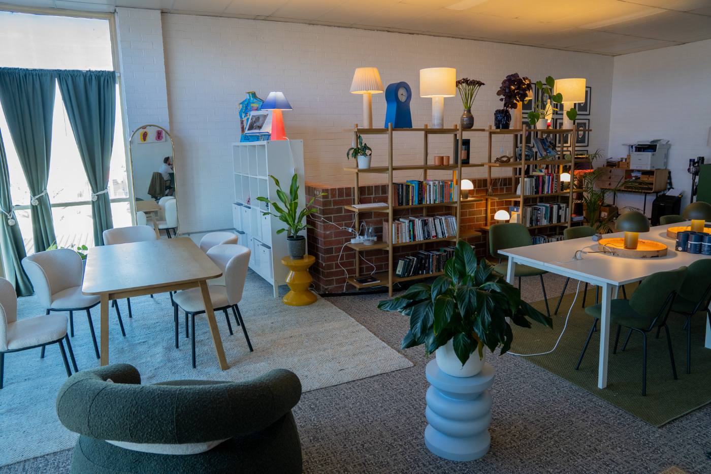 Shared work tables in front of the office library