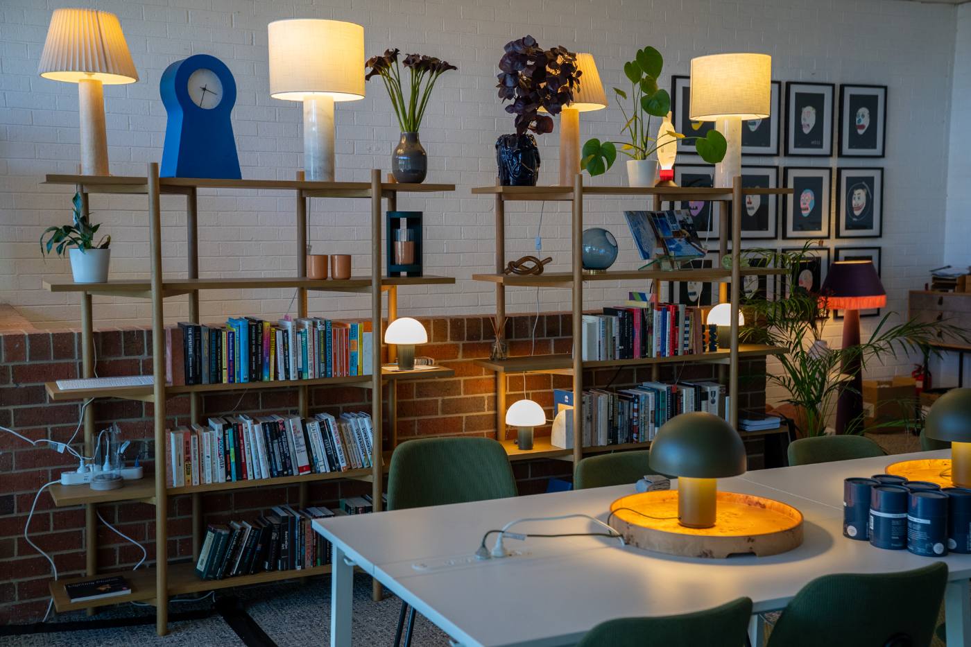 The open workspace with shelving and long tables